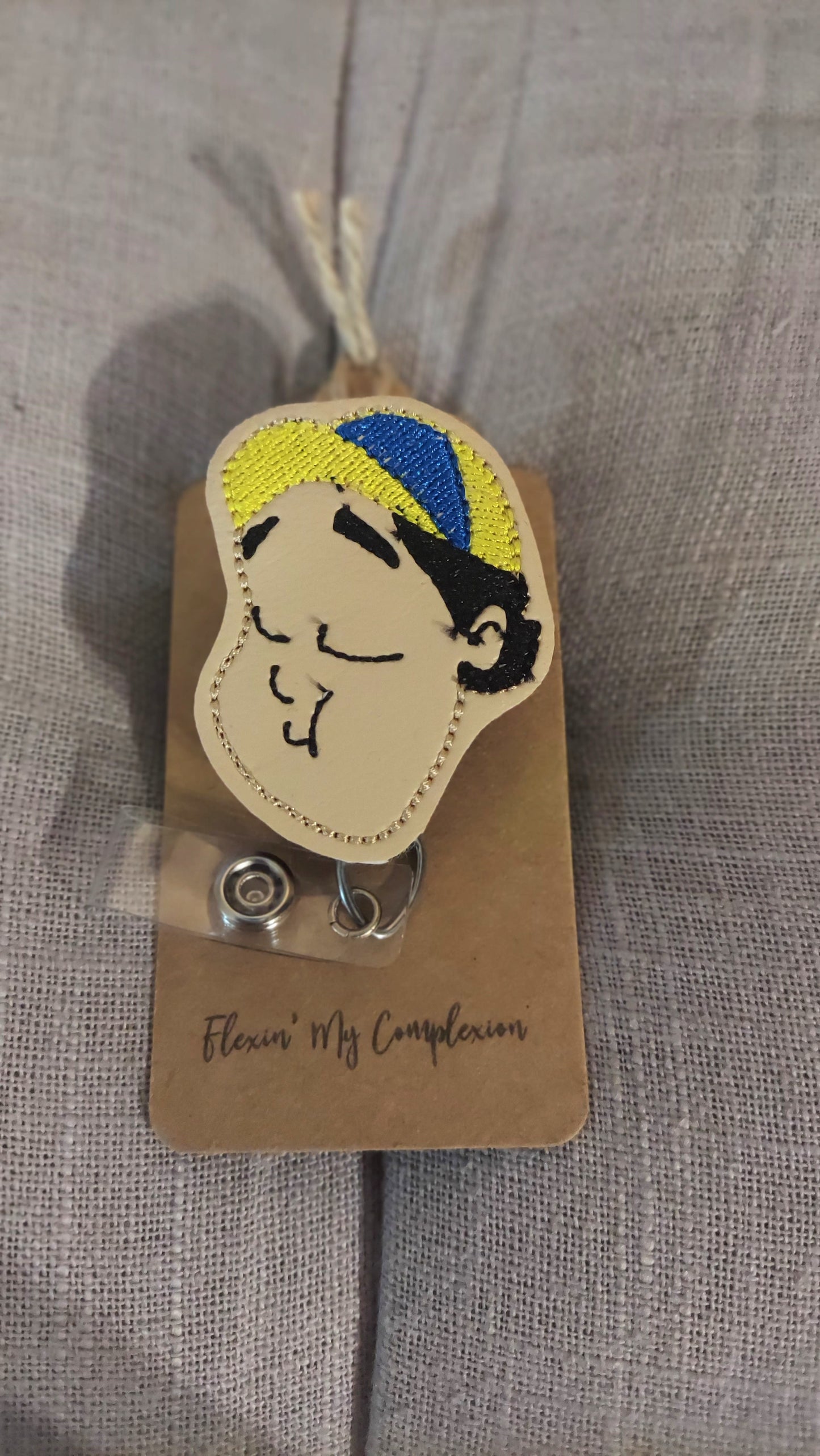 Quico Inspired Badge Reel